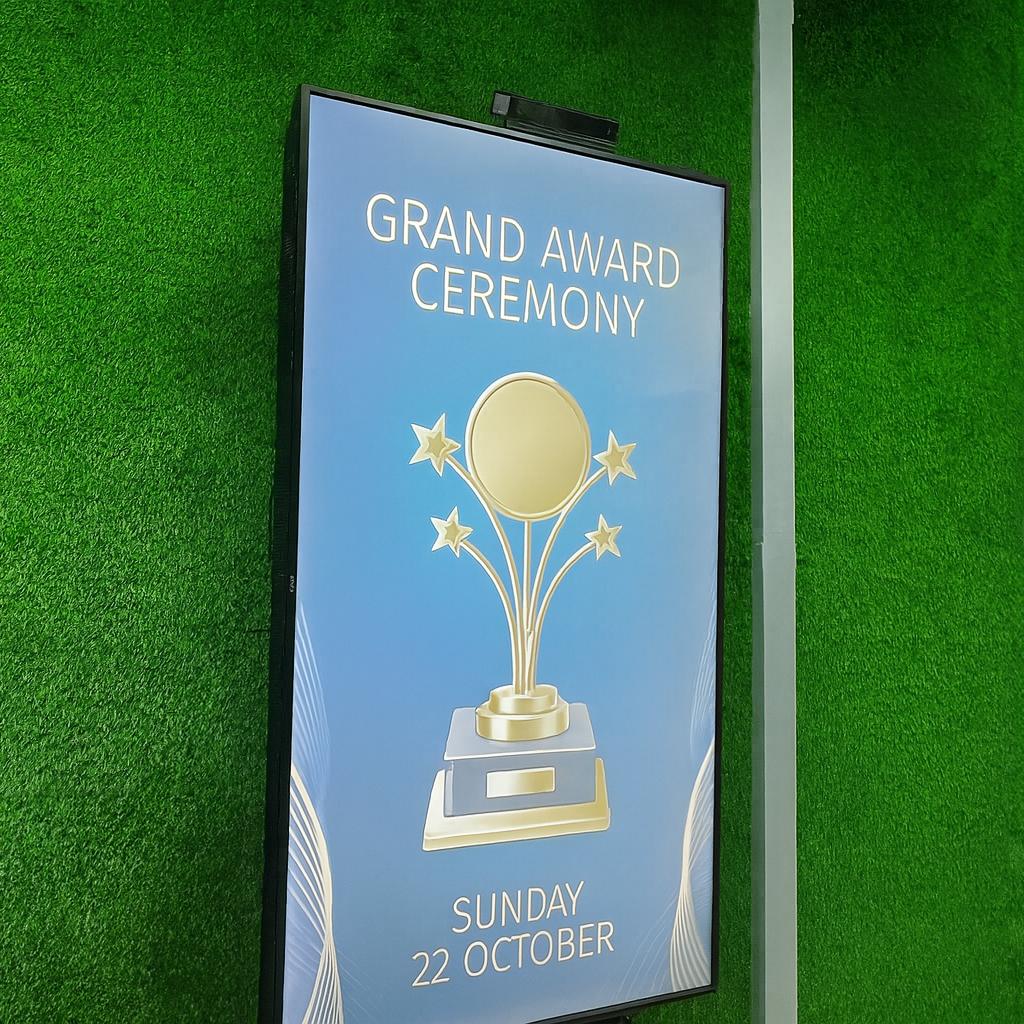 Calligraphy-style certificate printing setup at Dubai event